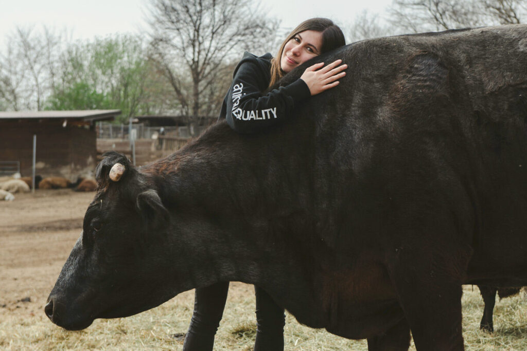 Animal Equality Executive Director in Italy, Alice Trombetta, in an Animal Sanctuary.