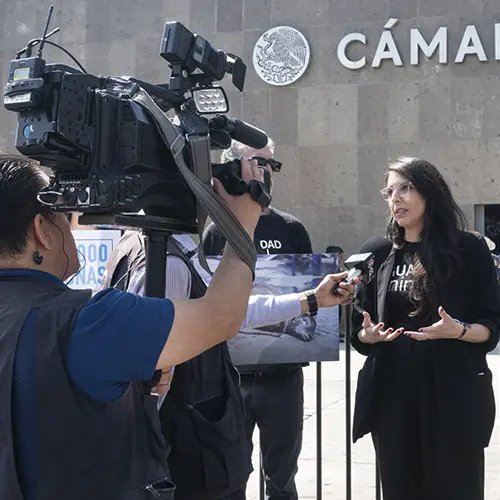 Camera recording event in exterior of Mexican Senate