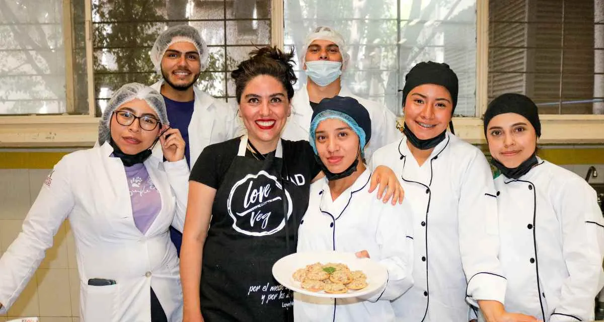 Students preparing plant-based foods in a Love Veg workshop